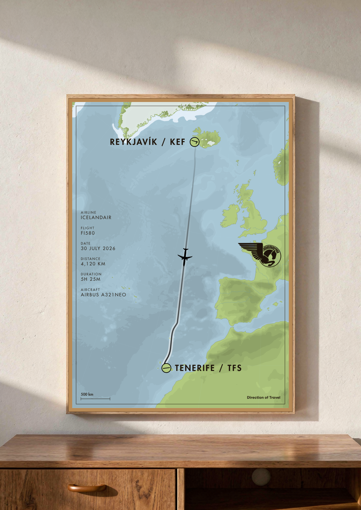 Reykjavík to Tenerife A2 poster in a wooden frame in a room (AI-generated)