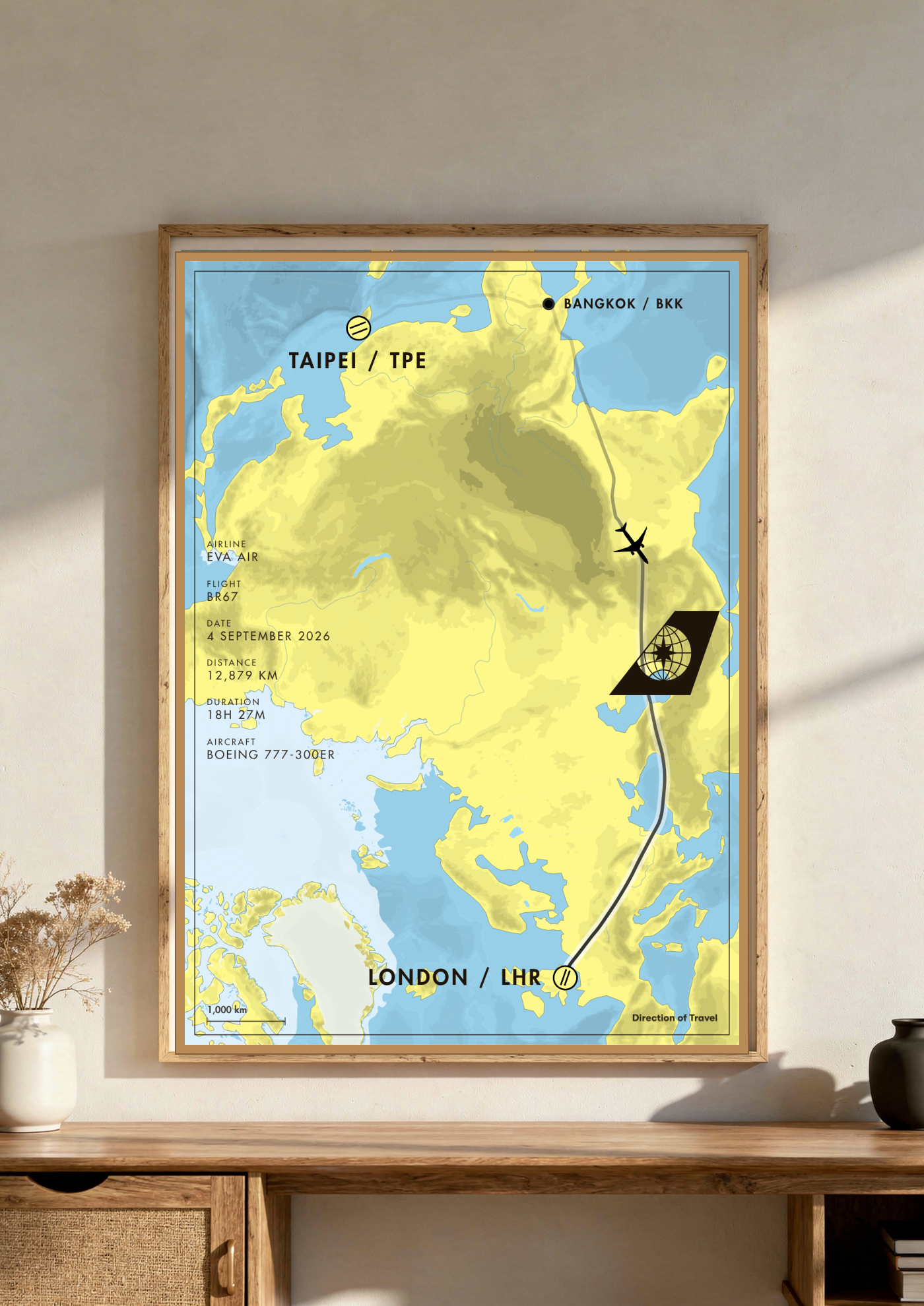 Taipei to London via BKK A2 poster in a wooden frame in a room (AI-generated)