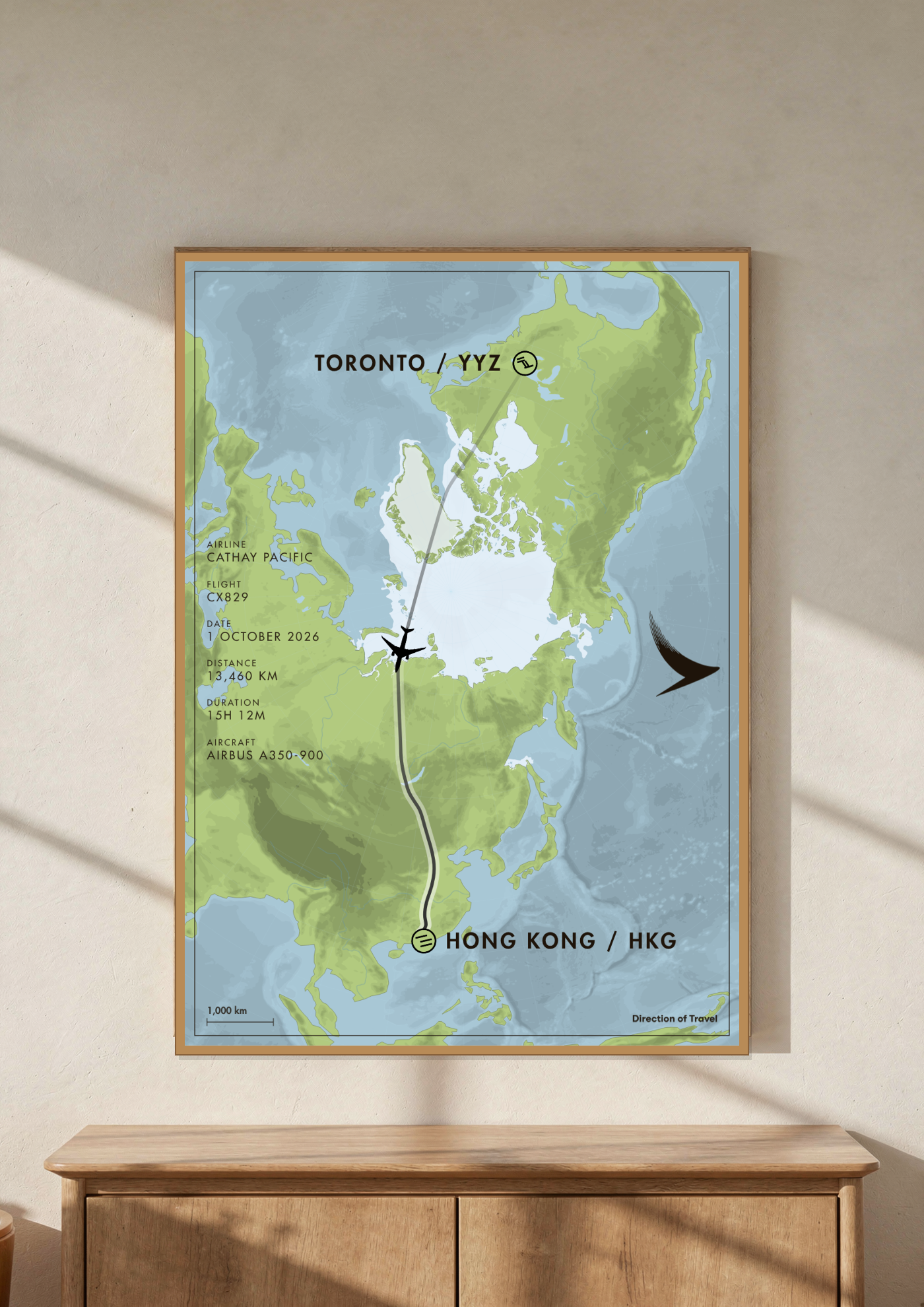 Toronto to Hong Kong A2 poster in a wooden frame in a room (AI-generated)