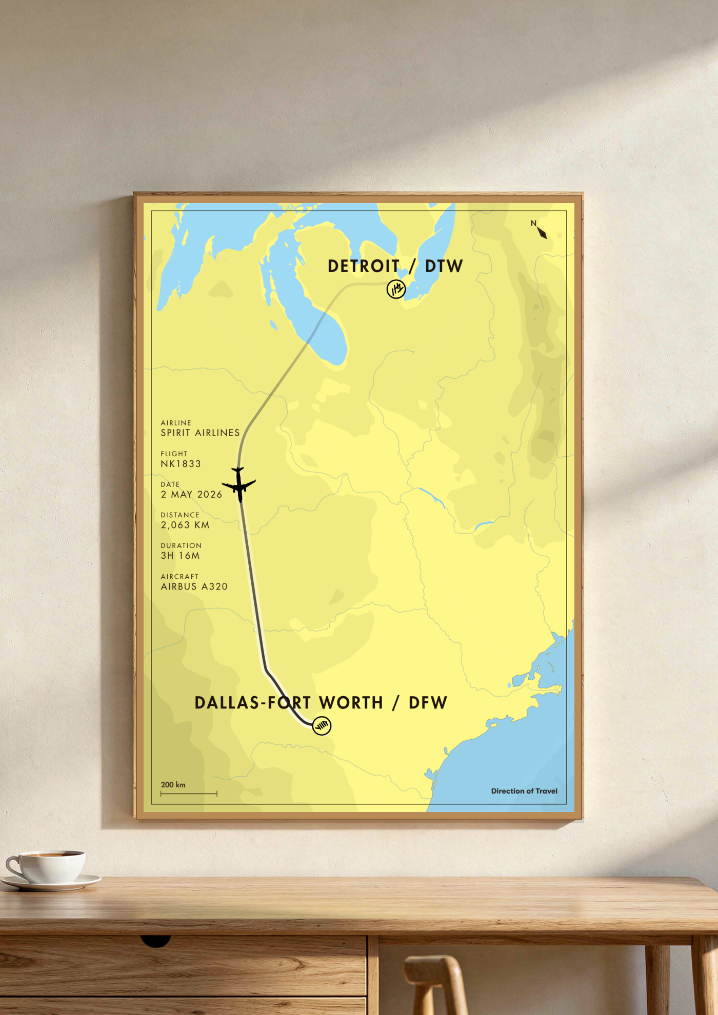 Detroit to Dallas-Fort Worth A2 poster in a wooden frame in a room (AI-generated)